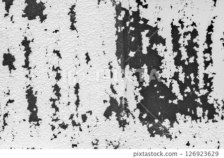 Peeling white paint on a black background 126923629