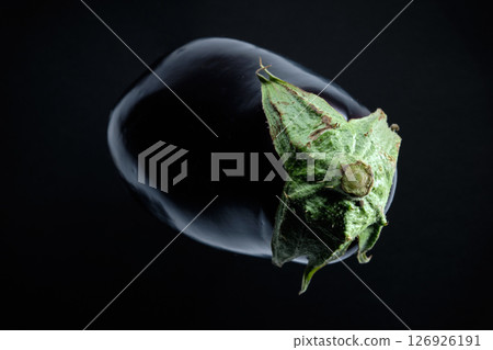 American eggplant on black background American eggplant on black background 126926191