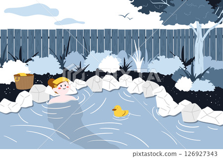 Woman relaxing in an outdoor hot spring with a toy duck. 126927343