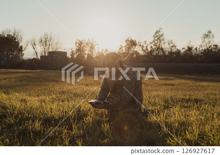 Soldier On His Knees Remembering His Lost Brother Soldier On His Knees Remembering His Lost Brother 126927617