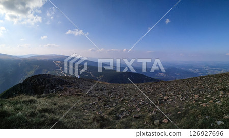 Panoramic view of snezka mountain from czech republic side showing slopes and valley in august Panoramic view of snezka mountain from czech republic side showing slopes and valley in august 126927696