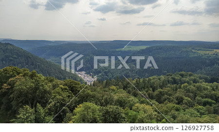 Panoramic view overlooking lush forests and rolling hills from konigstein fortress, saxony, germany Panoramic view overlooking lush forests and rolling hills from konigstein fortress, saxony, germany 126927758