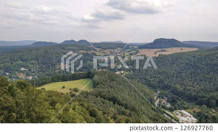 Panoramic view of saxon switzerland national park from konigstein fortress revealing majestic landscape Panoramic view of saxon switzerland national park from konigstein fortress revealing majestic landscape 126927760