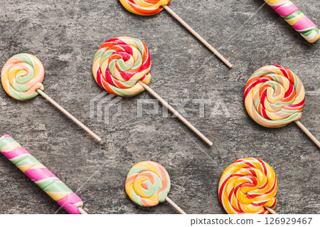 Set of colorful lollipops on colored background. Summer concept. Party Happy Birthday or Minimalist Concept 126929467