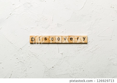 discovery word written on wood block. discovery text on table, concept 126929713