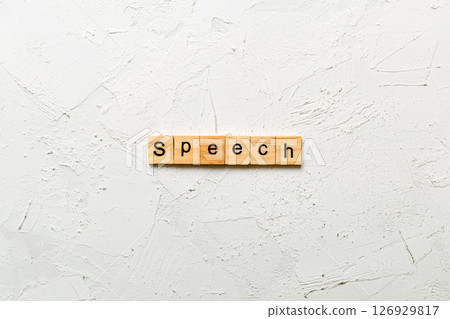 speech word written on wood block. speech text on cement table for your desing, concept speech word written on wood block. speech text on cement table for your desing, concept 126929817