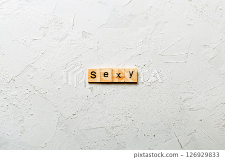 sexy word written on wood block. sexy text on table, concept sexy word written on wood block. sexy text on table, concept 126929833