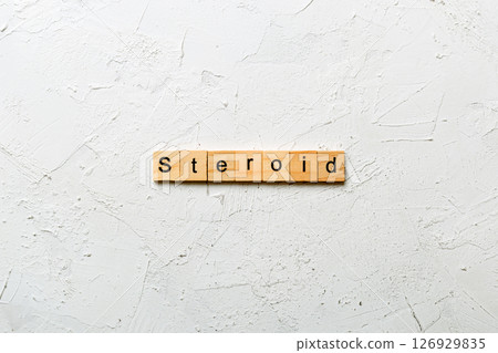 steroid word written on wood block. steroid text on table, concept steroid word written on wood block. steroid text on table, concept 126929835