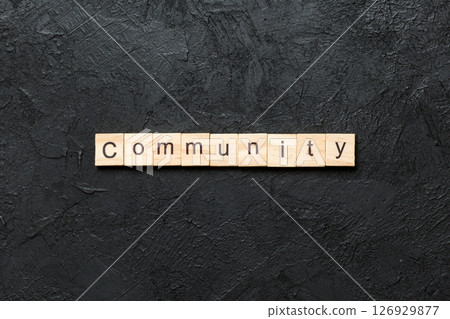 Community word written on wood block. Community text on table, concept Community word written on wood block. Community text on table, concept 126929877