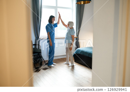 Nurse and her patient feeling good after a nice exercising 126929941