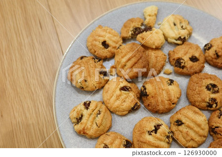 close up of homemade freshly baked raisin cookies flat lay on the plate with copy space close up of homemade freshly baked raisin cookies flat lay on the plate with copy space 126930000