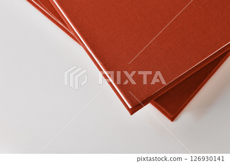 Two books on white table 126930141