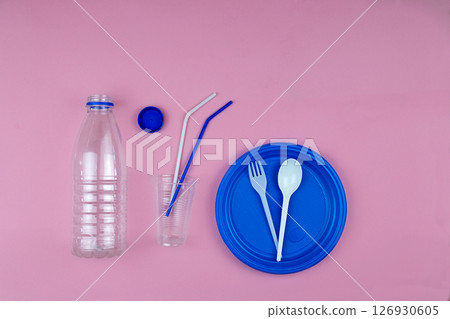 Empty plastic bottle, tableware, waste. Say no to single use plastic. 126930605