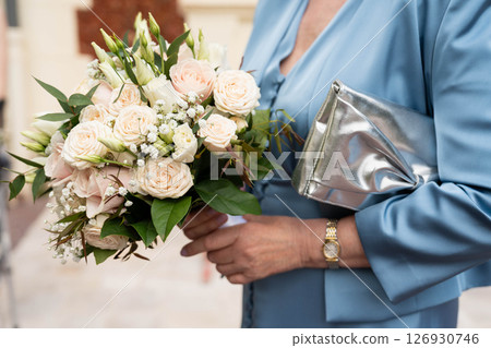 Bridal bouquet with roses, lisianthus and eucalyptus Bridal bouquet with roses, lisianthus and eucalyptus 126930746