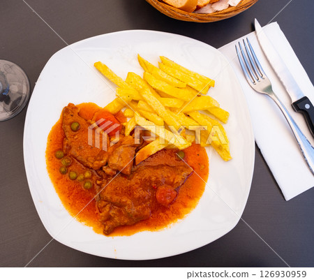 Stewed beef with vegetables - this is Spanish traditional meat dish 126930959