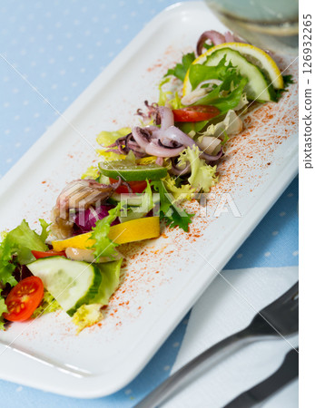 Salad with calamari, vegetables and lime Salad with calamari, vegetables and lime 126932265