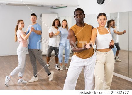 Young female and adult male dancing pair dance Young female and adult male dancing pair dance 126932577