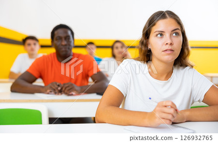 Girl studying in taxi driving school Girl studying in taxi driving school 126932765