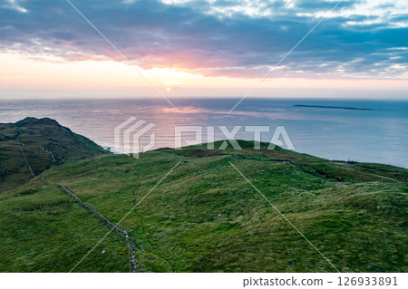 Aerial view of Dunmore Head by Portnoo in County Donegal, Ireland. Aerial view of Dunmore Head by Portnoo in County Donegal, Ireland. 126933891