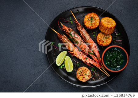 langoustines on skewers, shrimp kebab, with fried corn, spices and herbs, homemade, no people, 126934769