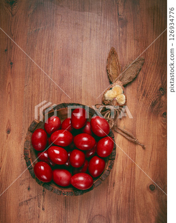 painted eggs in a wooden bowl, red, painted madder dye, powder from the roots of endro, with onion husks, top view, Easter, Georgia, painted eggs in a wooden bowl, red, painted madder dye, powder from the roots of endro, with onion husks, top view, Easter, Georgia, 126934776