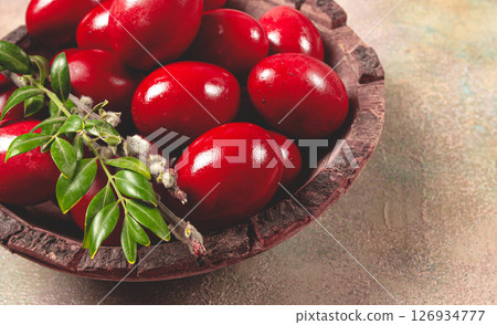 painted eggs in a wooden bowl, red, painted madder dye, powder from the roots of endro, with onion husks, top view, Easter, Georgia, painted eggs in a wooden bowl, red, painted madder dye, powder from the roots of endro, with onion husks, top view, Easter, Georgia, 126934777