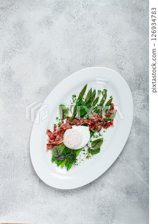 asparagus with poached egg and fried bacon, micro greens and spices, breakfast, homemade, no people, 126934783