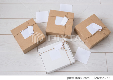 Many boxes with space for advertisement delivered from online store. Internet shopping and delivery concept. Mockup 126935268