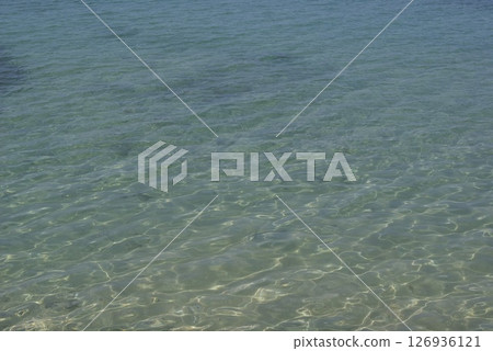 The clear blue surface of the sea 126936121