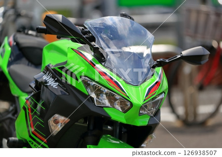 Parked Japanese motorcycle Parked Japanese motorcycle 126938507