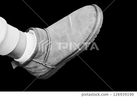 Black white women legs in warm ugg boots 126939190