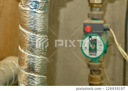 Water pipe insulated with metal foil, pressure sensor Water pipe insulated with metal foil, pressure sensor 126939197