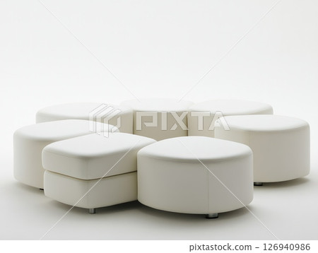 Circular arrangement of white ottoman seats on a white background 126940986
