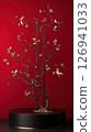 Artistic rendering of a stylized tree with birds and flowers 126941033