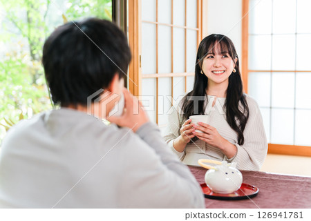 Couple drinking tea at a Japanese-style inn, restaurant, or Japanese-style restaurant (matchmaking, marriage hunting) 126941781