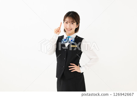 A woman in a uniform making a recommended pose A woman in a uniform making a recommended pose 126942667
