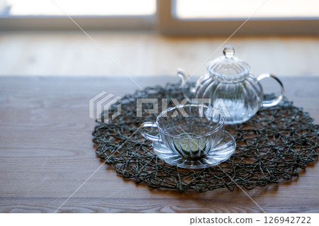 Glass tea set on a table 126942722