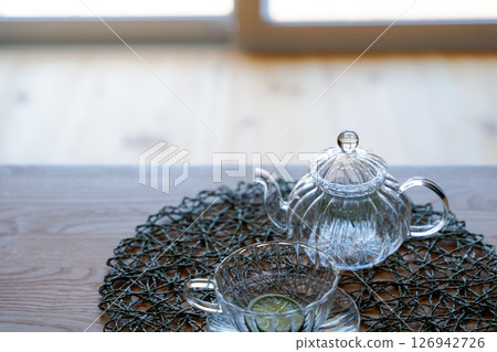 Glass tea set on a table 126942726