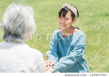 Elderly people, senior women, grandchildren interacting with grandmother, daughter, children 126943704