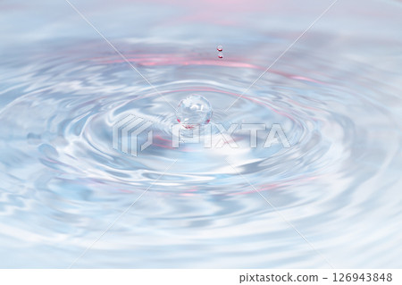 Drops of water falling on the surface of the water. Drops of water falling on the surface of the water. 126943848