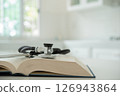 stethoscope  medical book 126943864