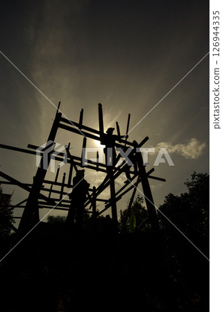 Construction work overtime and workers work in the evening 126944335