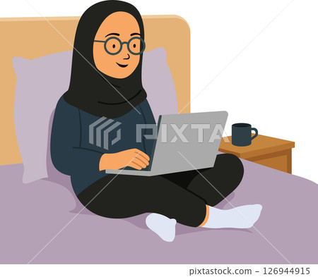 Woman with hijab relaxed on bed remote working at home Woman with hijab relaxed on bed remote working at home 126944915