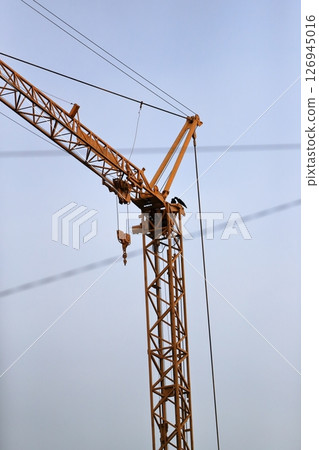 Image of a crane (fixed horizontal jib crane) at a construction site 126945016