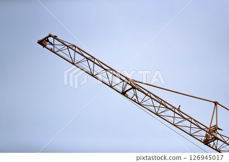 Image of a crane (fixed horizontal jib crane) at a construction site 126945017