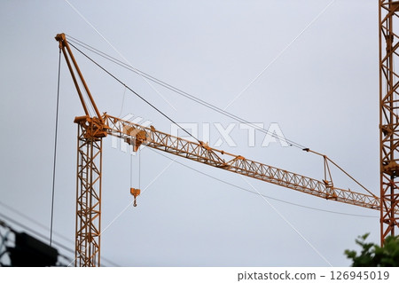 Image of a crane (fixed horizontal jib crane) at a construction site 126945019