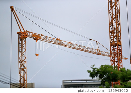 Image of a crane (fixed horizontal jib crane) at a construction site Image of a crane (fixed horizontal jib crane) at a construction site 126945020