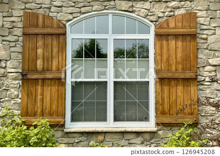 arched window with wooden shutters arched window with wooden shutters 126945208