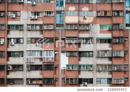 Old and crowded taiwan apartment, Chinese taipei city condominium building windows Old and crowded taiwan apartment, Chinese taipei city condominium building windows 126945452