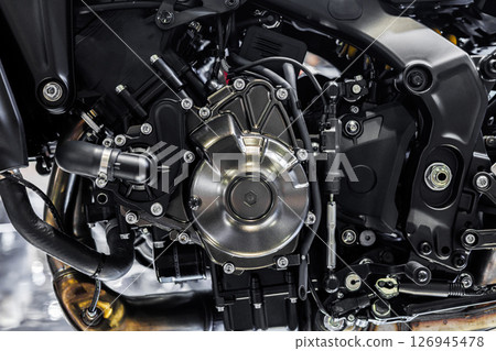 Closeup modern high Performance racing motorcycle engine metal part Closeup modern high Performance racing motorcycle engine metal part 126945478